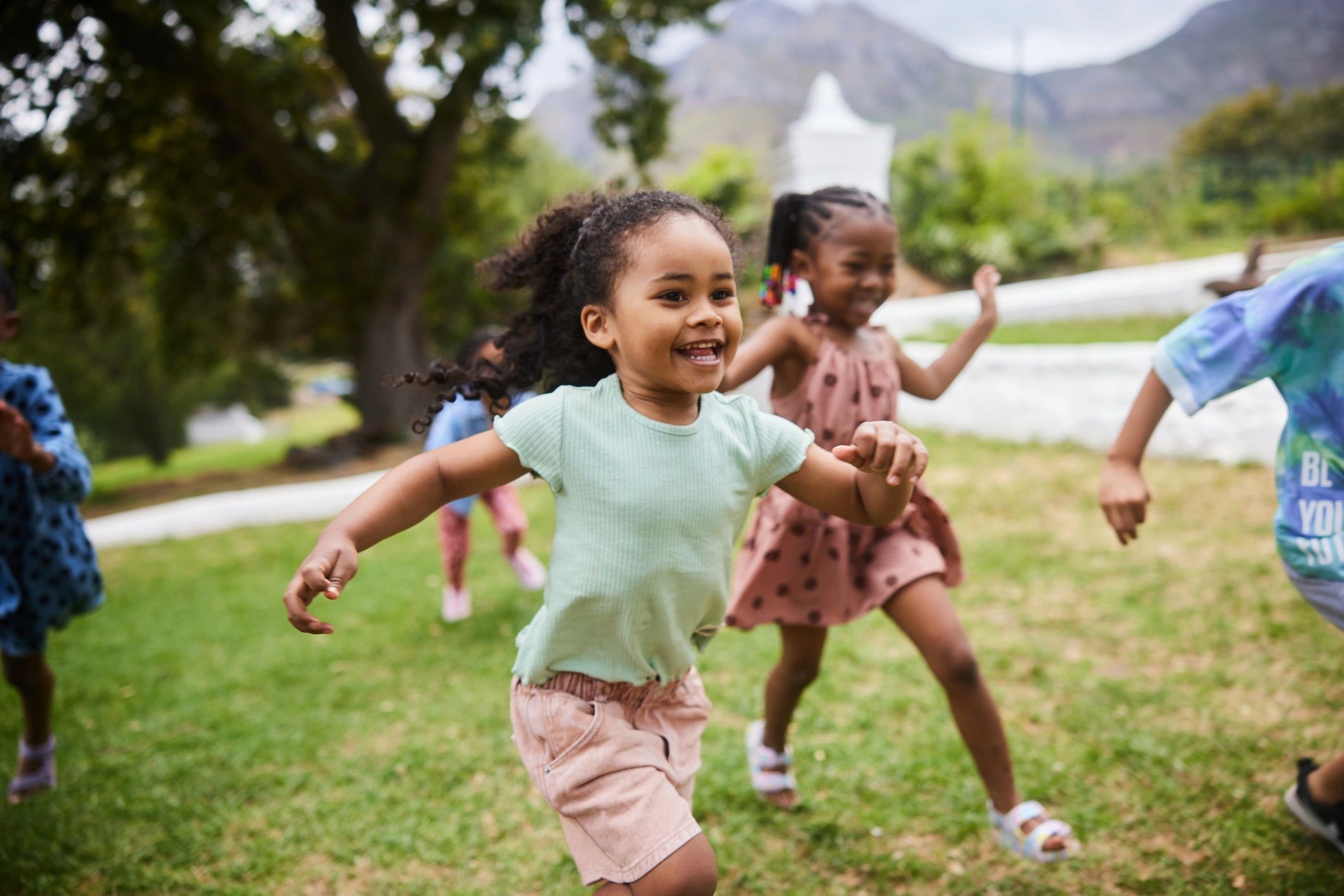 Children running and playing outdoors