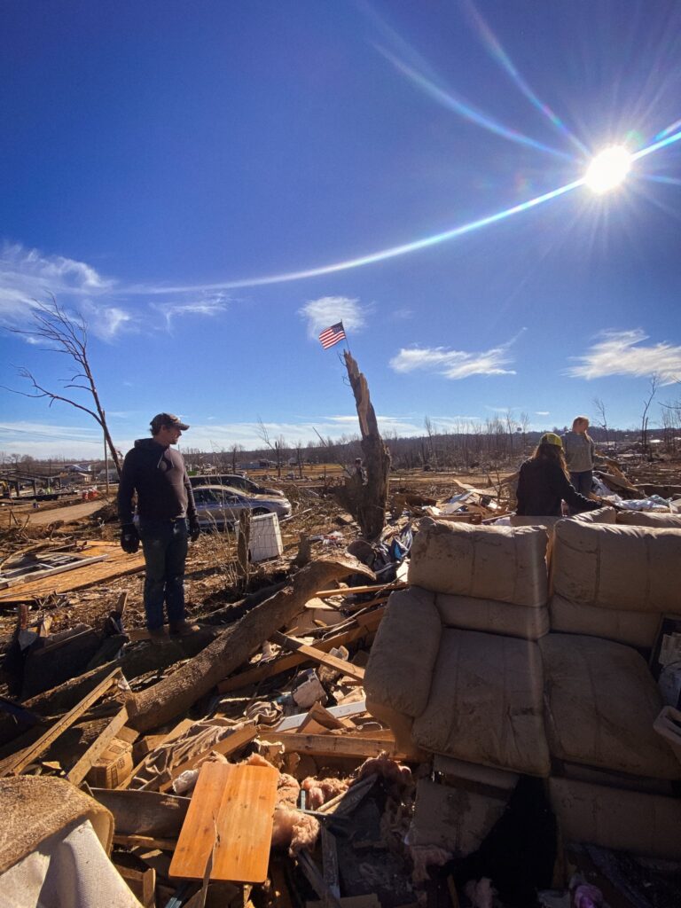 Circle C Relief volunteers organizing relief supplies for community distribution